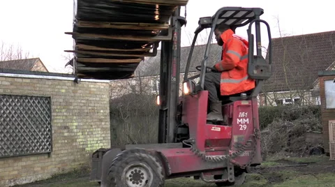 Forklift driver turning large, heavy load around. Stock Footage 46741775