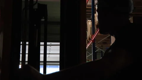 Forklift Driver Working In Warehouse Stock Footage 136395234