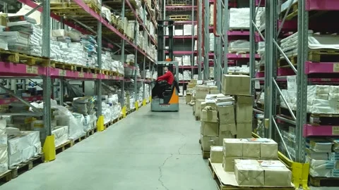 Forklift drives through the warehouse Stock Footage 170481290