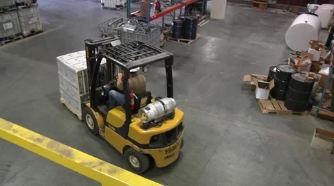 Forklift driving in Warehouse Stock-Footage 43886657