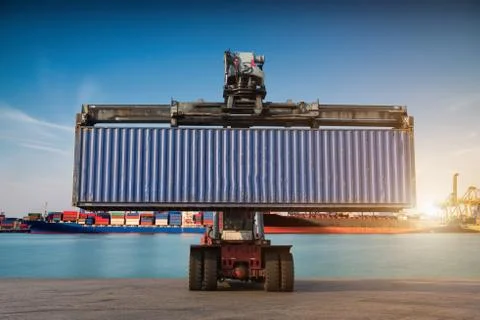 Forklift handling container box loading Stock Photos