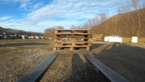 Forklift insert and release forks from pallets Stock Footage 121724742