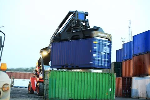 Forklift Lifting Containers Stock Photos