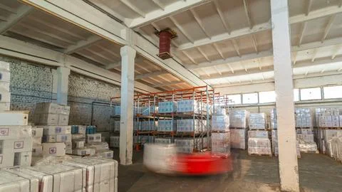 Forklift loader and cargo boxes storing at warehouse timelapse hyperlapse Stock Photos