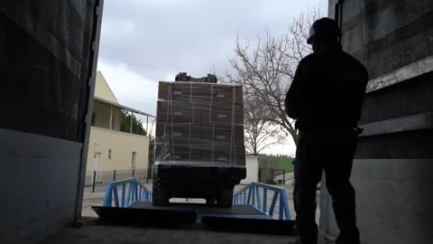 Forklift Loader Load Boxes Into A Truck And the Manager checks the loading 스톡 동영상 140356758