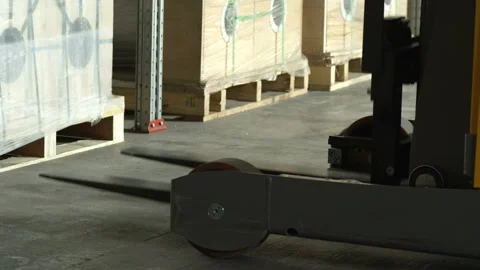 The forklift loader in the warehouse removes the goods from the rack. Stock Footage 89918351