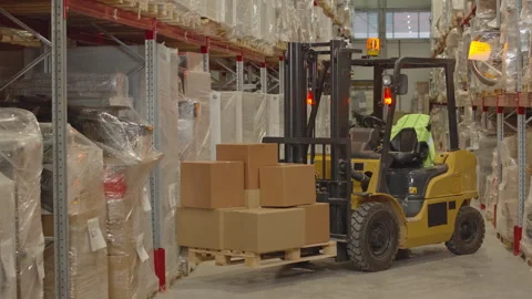 Forklift Machine with Red Beam Light at Warehouse Stock Footage 242613739