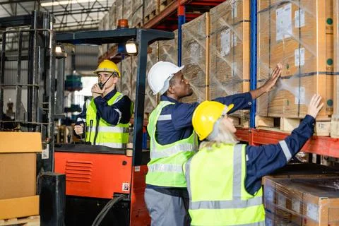 Forklift machine in warehouse Stock Photos