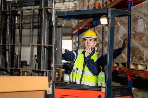 Forklift machine in warehouse Stock Photos
