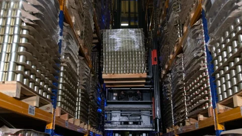 A forklift maneuvering through a warehouse Stock Footage 325342659