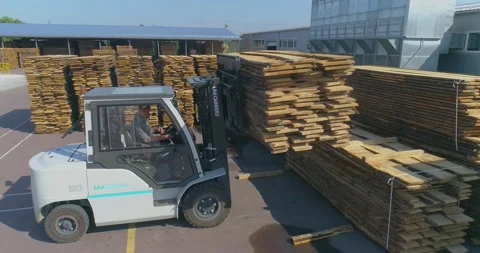 Forklift in a modern factory. Working process in a woodworking factory Vidéo 183889577