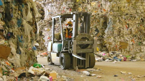 FORKLIFT MOVES RECYCLABLES Stock Footage 6530298