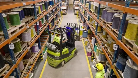 Forklift Moving Cable Spools in Industrial Warehouse, Automotive Supply Chain Stock Footage 334665892