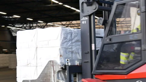 Forklift moving pulp into paper factory 29 January 2022, Amsterdam Stock Footage 294349805