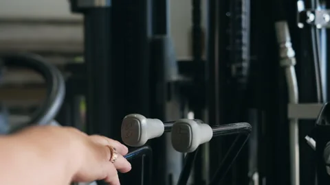 Forklift Operator Activating Hydraulic Lift Control Lever. Stock Footage 345012470