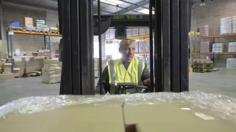 Forklift Operator Moving Pallet Large Industrial Warehouse Stock Footage 335981388