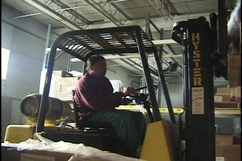 Forklift Operator Placing Skid 2 Stock Footage 300245