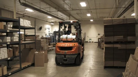 Forklift Operator Waves Hello In Warehouse 1 Stock Footage 89587757