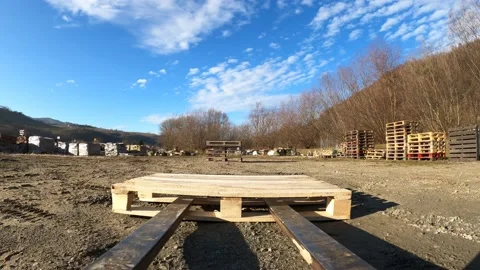 Forklift picking up and stacking pallets Stock Footage 121726184