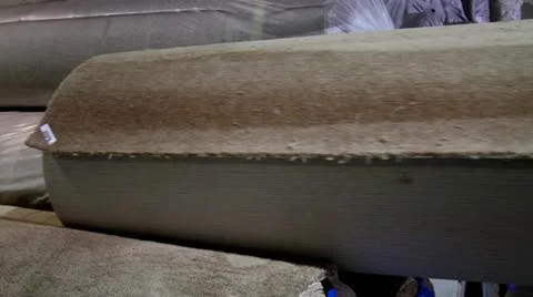 Forklift Stacking Rolls of Carpet Stock Footage