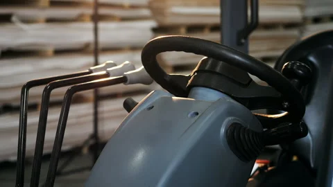 Forklift Steering Wheel and Control Levers Close Up in Warehouse Vídeo Stock 345013196