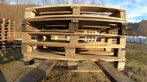 Forklift traveling and release stack of pallets Stock Footage 121725000