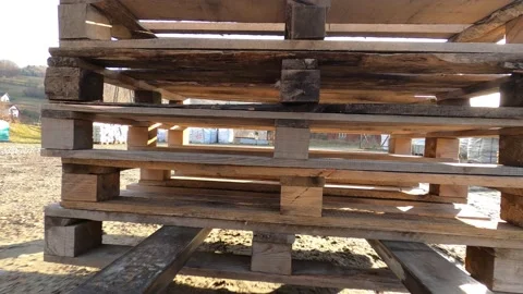Forklift traveling with stack of pallets and release Stock Footage 129048758