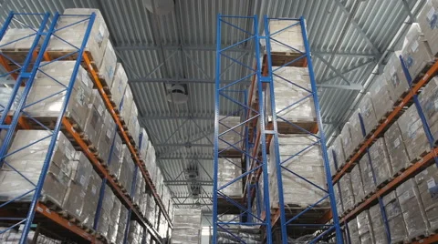 Forklift Truck Driver Loading Pallet In Storage Warehouse Video stock 64011775