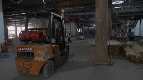 Forklift Truck Shot Using A Camera Stabiliser In Industrail Building Site Stock Footage 92692137
