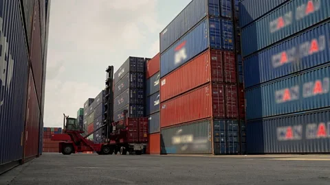 Forklift trucks are stacking containers in the warehouse Stock Footage 130881579