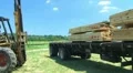 Forklift Unloading Construction Lumber 02 HD Footage