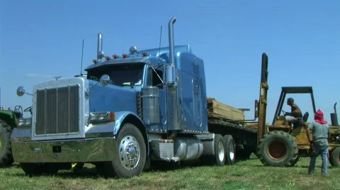 Forklift Unloading Construction Lumber 03 Stock Footage