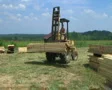 Forklift Unloading Construction Lumber SD Footage