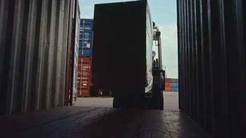 Forklift Unloading a Container in Terminal Video stock 147226303