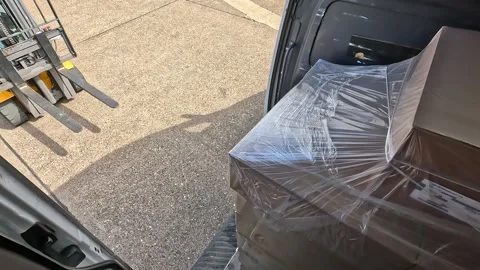 Forklift Unloading Pallet Cargo from Delivery Van Stock-Footage 333936983