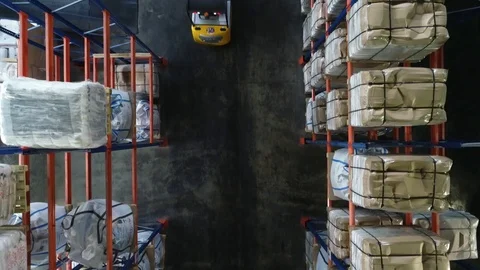 Forklift Unloading Stack Of Boxes In A Delivery Truck. Products at the warehouse Stock Footage 124038773