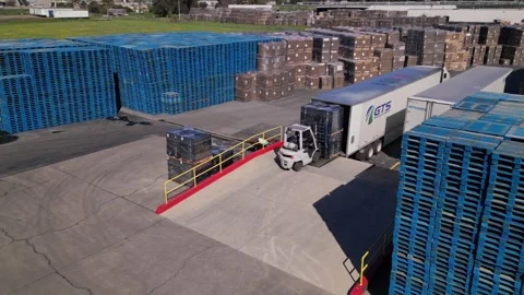 Forklift unloading truck Stock Footage 241938443