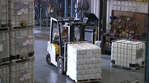 Forklift in Warehouse carrying boxes Stock-Footage 43891374