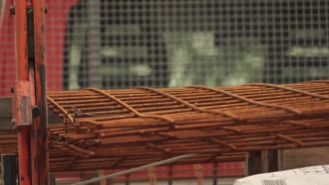 Forklifter loading and unloading metal mesh into truck Stock-Footage 243708527