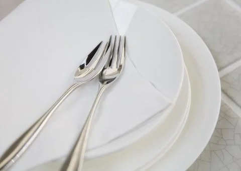 Forks and dishes Stock Photos