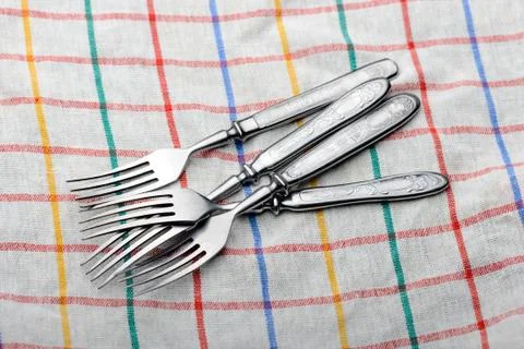 Forks on a dishcloth 写真素材