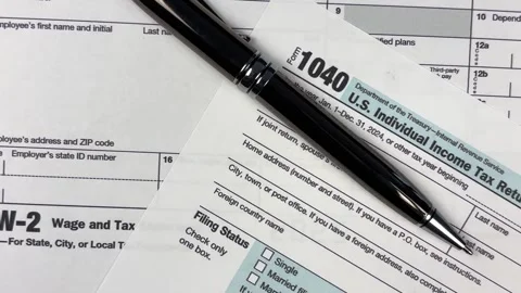 Form 1040 and pen Stock Footage 304645768