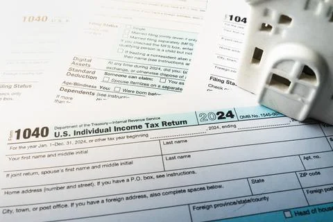 Form 1040 is ready for completion as individuals prepare their annual income tax Stock Photos