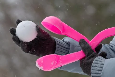 Form for making round snowballs Stock Photos
