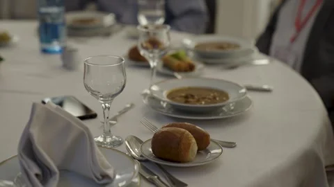 Formal Banquet Table Setting at a Corporate Event Stock Footage 318580348