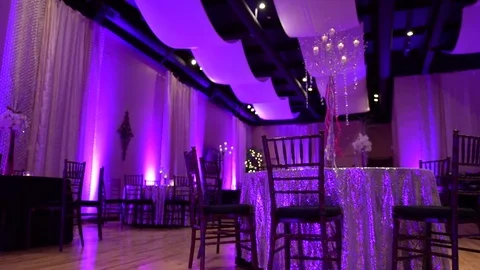 Formal chairs and place setting at wedding reception venue Stock Footage