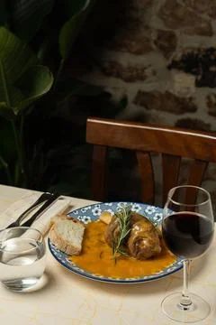 Formal Dinner with Meat and Red Wine Stock Photos