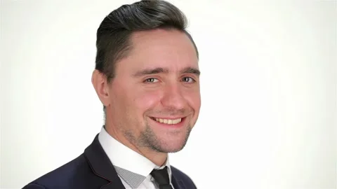 Formal dressed man winks and smiling Stock Footage 252651556