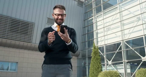 Formal Dressed Office Worker Standing Outdoor Office and Using Smartphone Stock Footage 124659090