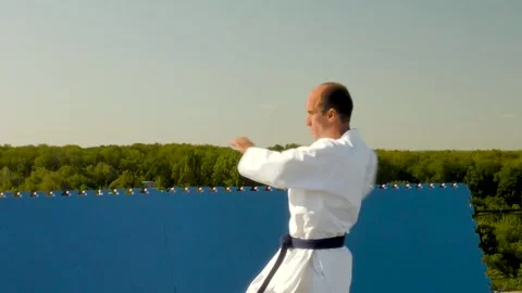 Formal exercise of karate is done by the athlete in karategi Video stock 142328252